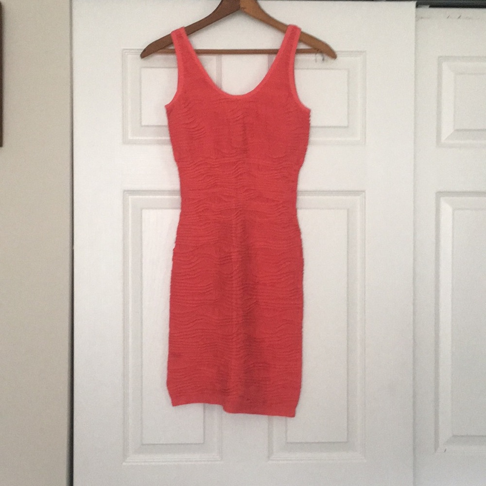 Pink body con dress with low back